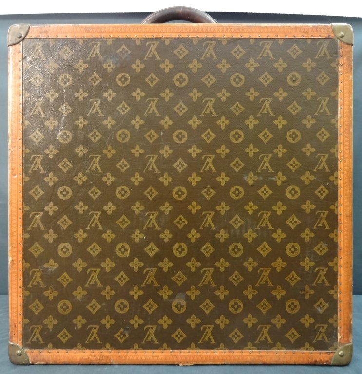 Antique (1910-1920) Louis Vuitton Suitcase: Antique Louis Vuitton suitcase with original "R" monogram. 20" L x 20" W x 9 1/2" D, very good condition with some typical usage wear. Special-ordered by owner of J. Walter Thompson.