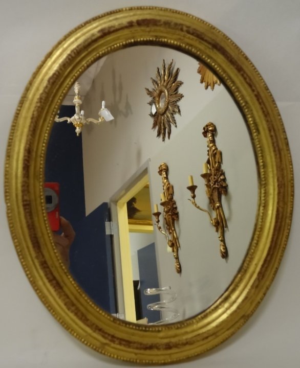 Mid-Century Gilt Italian Oval Mirror: Mid-century gilt Italian oval mirror. 14" H x 11 1/2" W, very good vintage condition.