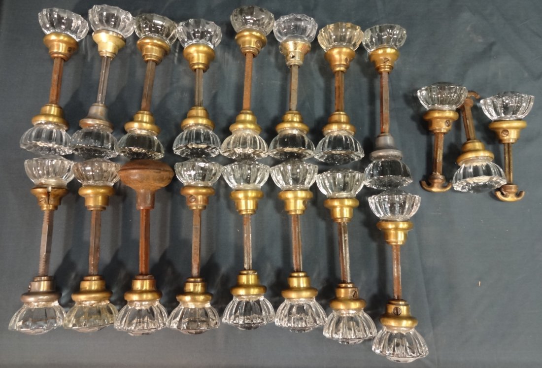 Set of 18 Vintage Brass+Glass+Plastic Doorknobs: Set of eighteen vintage brass and glass (some Lucite?) doorknobs. Fifteen double-sided, three single. Largest measure 7" L, very good used condition.