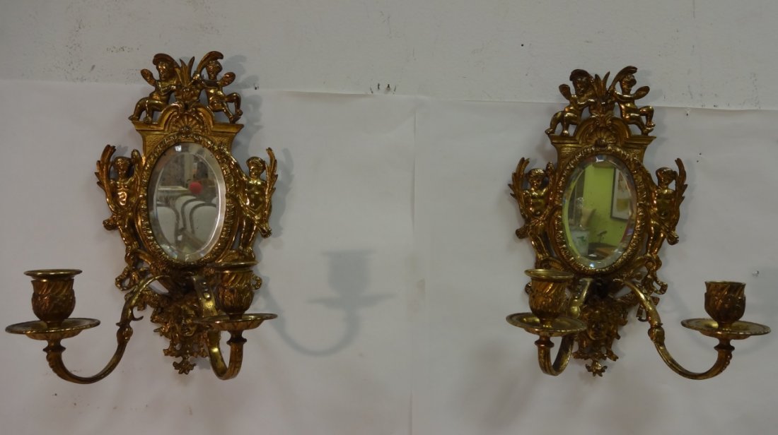 19th Century British Brass Mirrored Wall Sconces: 19th century British brass mirrored wall sconces. 8 1/4" W x 5 3/4" D x 12" H, very good antique condition.