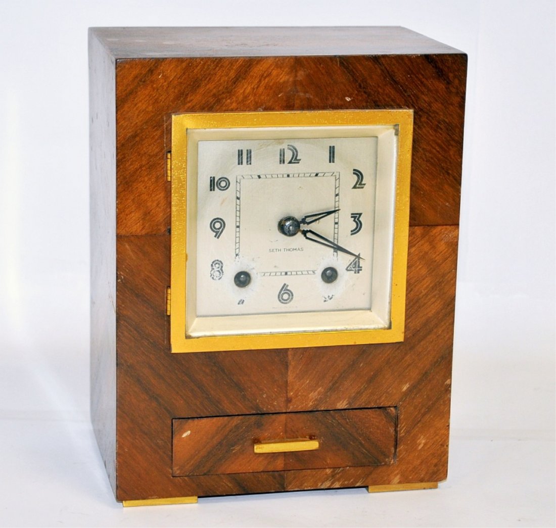 Seth Thomas Art Deco Desk/Mantle Clock: Seth Thomas Art Deco desk/mantle clock with small drawer. Appears to work, may need cleaning. 6 1/2" W x 4 1/2" D x 8 1/2" H, very good condition.