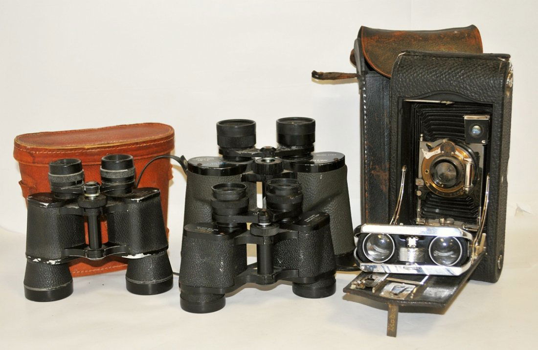 Lot/Binoculars,Opera Glasses,Kodak Bellows Camera: Lot including three pairs of binoculars (one case), one pair of opera glasses, one Kodak collapsible Bellows Camera with case. Largest (camera) measures 10" W x 5" D x 3" H, overall very good conditio
