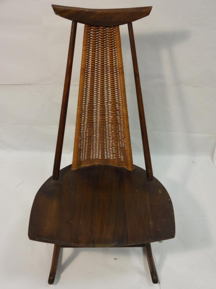 Finnish Mid-Century Ilmari Tapiovaara Rocker: Finnish mid-century wicker rocking chair by Ilmari Tapiovaara, featured in the "Dr. No" movie. Listed on 1stdibs for $1850. 21 1/2" W x 29 1/2" D x 37" H, very good vintage condition.