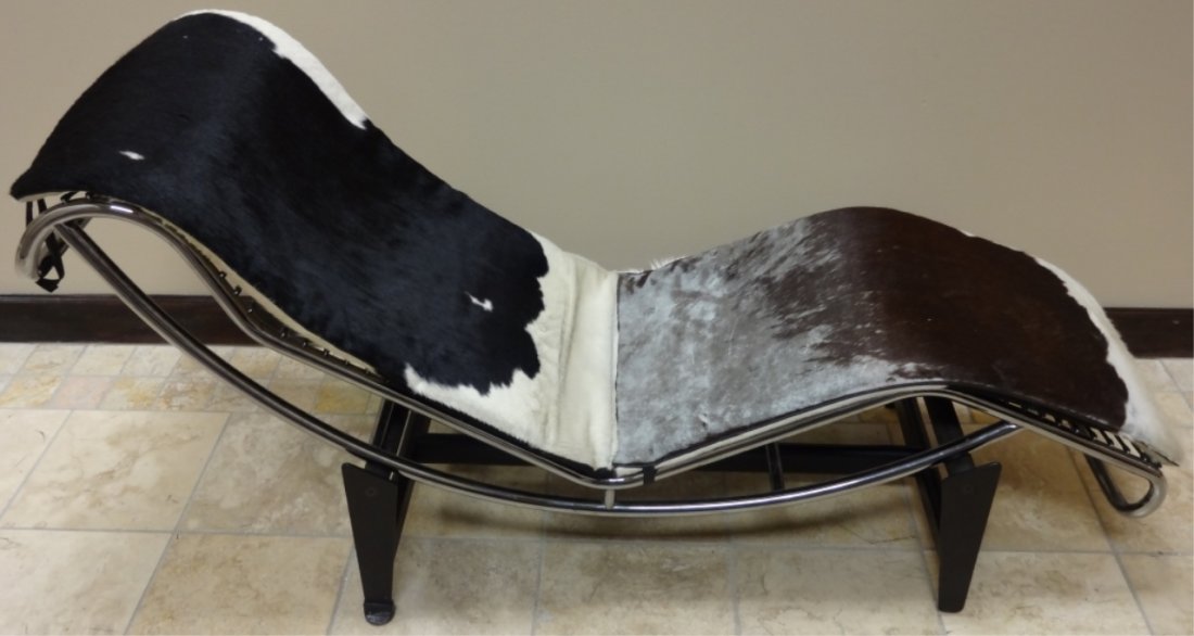 Mid-Century Le Corbusier Cowhide Lounge Chair: Mid-century Le Corbusier cowhide lounge chair. Cowhide measures 64" W x 21" D, stand measures 36" W x 22 1/2" D x 12" H, very good vintage condition.