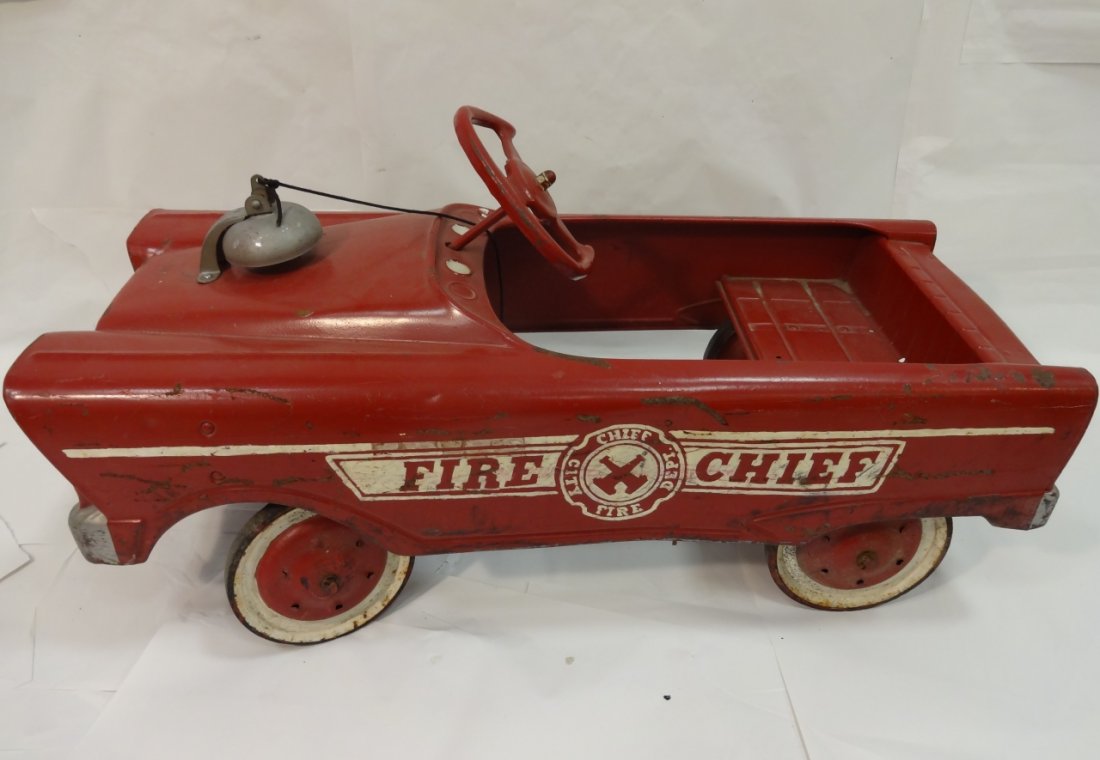Mid-Century "Fire Chief" Children's Pedal Car: Mid-century metal Fire Chief kiddie pedal car with bell on hood. 34 3/4" W x 15 1/2" D x 18" H. Good condition with some oxidation and wear.