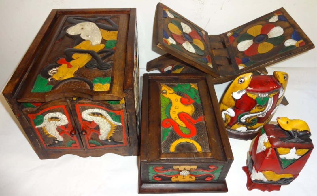 4 Vintage Bali Painted Wood Boxes & 1 Book Stand: Four vintage Bali hand-painted wooden boxes and one book stand. Widest measures 15 7/8", deepest 8 1/4", highest 8", very good used condition. From the home of Mary Rockefeller.