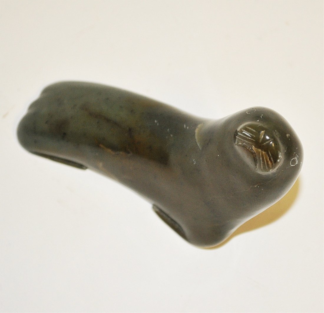 Inuit Carved Stone Zoomorphic Seal- Signed: Inuit carved stone zoomorphic seal. Signed on base, 4 1/4" W x 3" D x 1 1/4" H, very good condition.