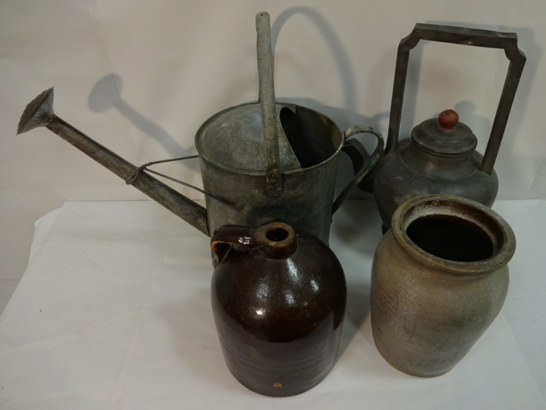 Lot of 4 Metal and Pottery Items: Lot of four items: metal watering can, 23 7/8" W x 10" D x 18" H - a pewter kettle with long handle, 11 3/4" W x 9" D x 1 1/2" H - one brown jug, 7" dia. x 9 1/2" H - a grey earthen ware vase, 7" dia.