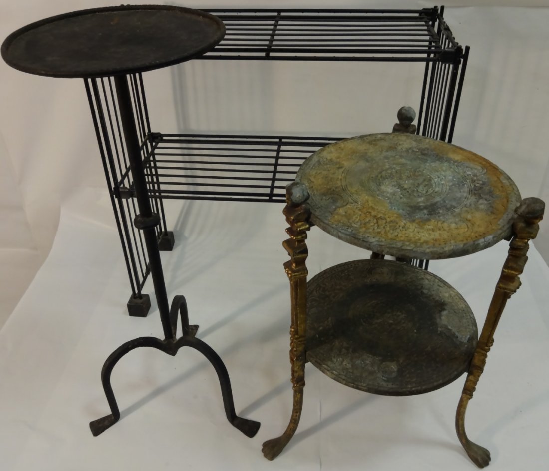 Lot of 3 Antique Iron Furniture Pieces: A lot of 3 antique iron pieces. Black iron shelf on 4 wooden feet, 22 3/4" W x 9 1/2" D X 21 1/2" H - small cast iron table with 3 legs and round top, 13" dia. x 24" H - weathered cast iron table with