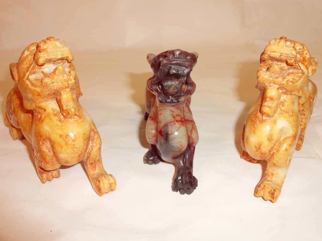 Set of 3 Oriental Carved Hardstone Dragons: A set of 3 carved dragons. Two soapstone dragons, 5" W x 1 5/8" D x 3 3/4" H. 1 jadeite dragon, 6" W x 1 5/8" D x 3 5/8" H. All in excellent condition.