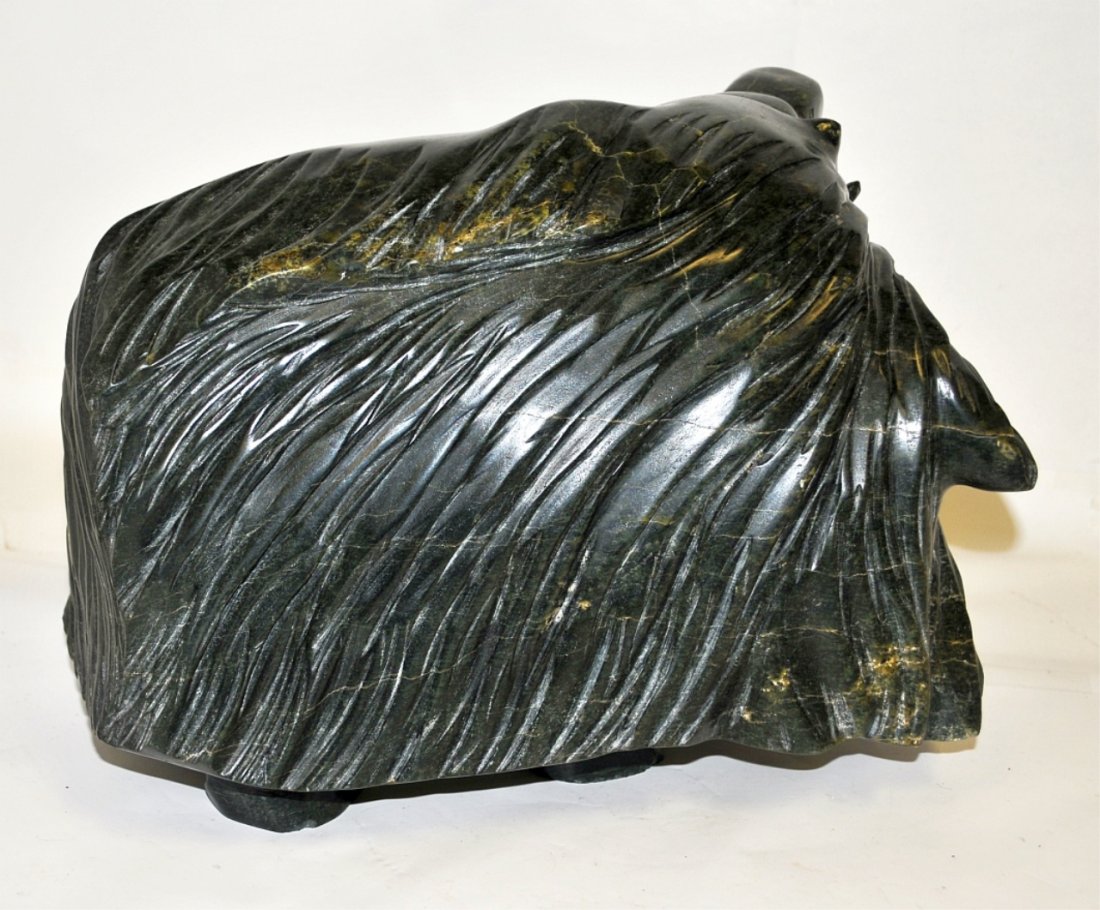 Signed Antique Inuit Hardstone Wooly Yak Carving: Large Inuit carved hardstone wooly yak sculpture, signed "Tara" (?). 14" W x 7" D x 10" H, very good antique condition.