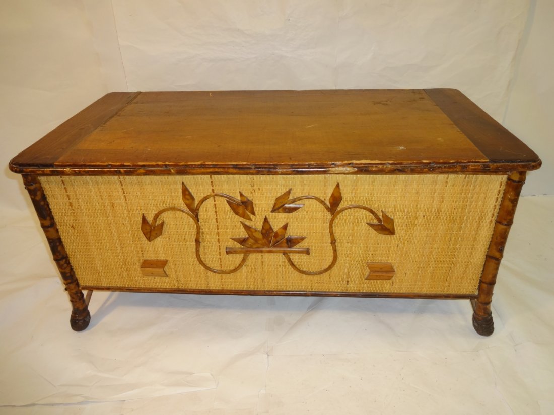 Vintage Wood, Bamboo and Wicker Chest: A vintage wood, bamboo and wicker chest with hinged lid and applied bamboo piece design. 37" W x 17" D x 17" H. Piece of bamboo missing from the back but otherwise good vintage condition.