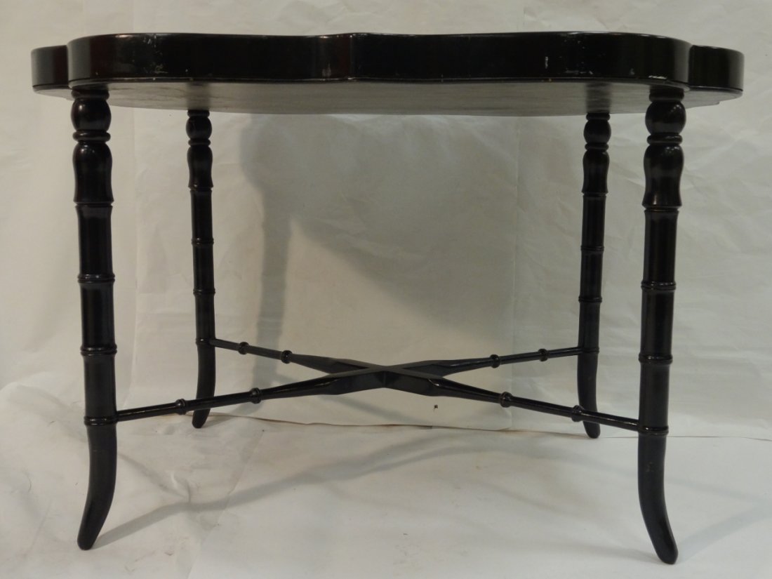Vintage Black and Floral Painted Tray Table: A vintage wood painted black with floral design border tray table. Custom wood base with bamboo shaped legs and X stretcher. Very nicely painted. 31 1/2" W x 24 1/2" D x 20 7/8" H. Very good condition
