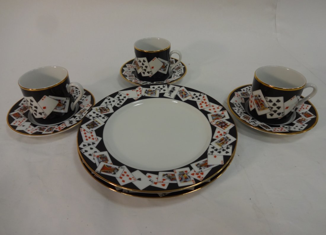 Set of Tiffany Porcelain w/Playing Card Motif: A set of Tiffany porcelain. Three demitasse cup, 3 1/2" W x 2 9/16" D x 2 3/8" H, three saucers, 4 7/8" dia. x 3/4" H and 2 plates measuring 7 7/8" dia. x 7/8" H. All in excellent condition.