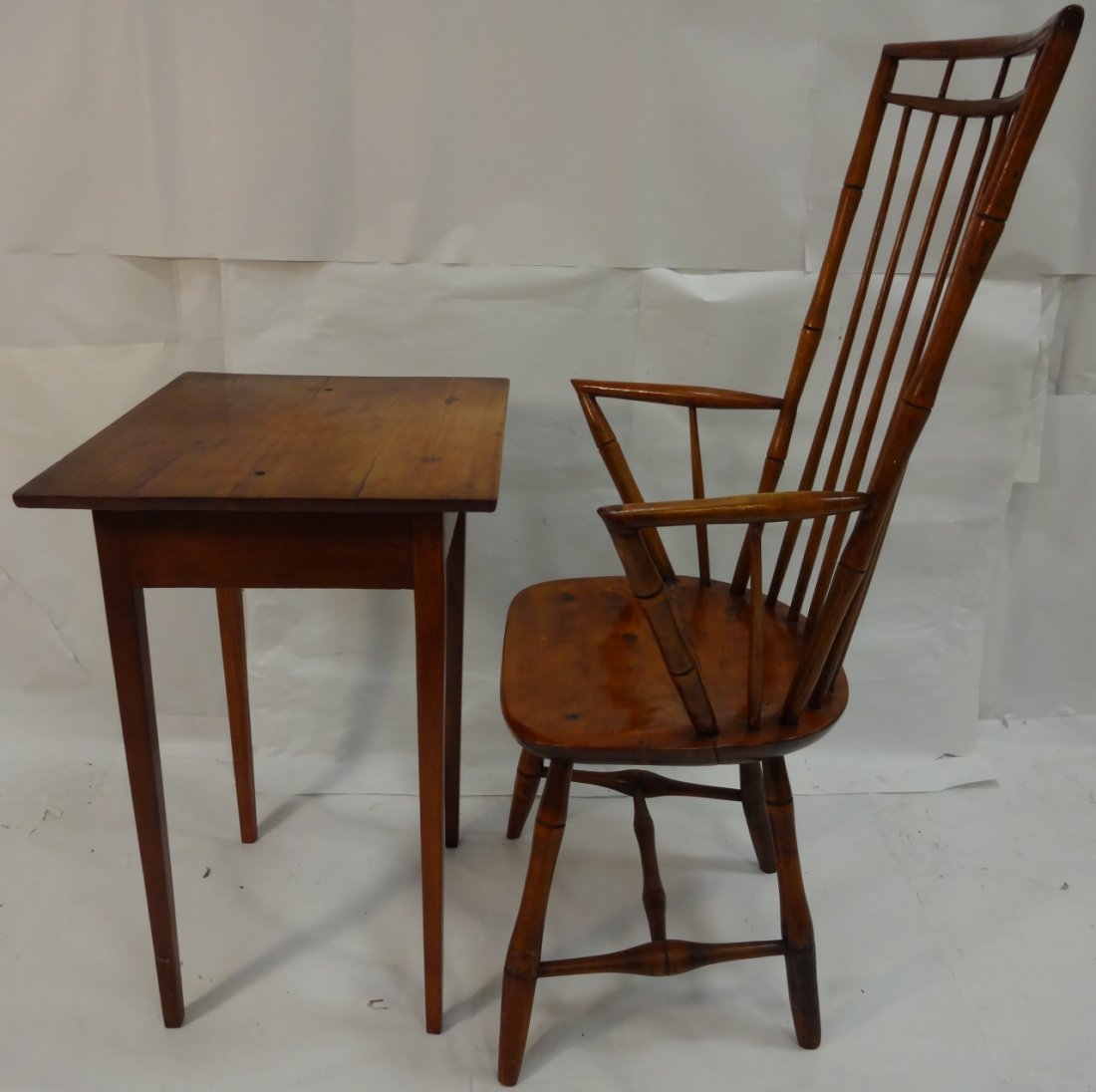 Antique Pumpkin Pine Chair and Side Table: An antique pumpkin pine chair and side table. Table measures 20 1/4" W x 17" D x 26 5/8" H, very good condition. Chair measures 23 1/2" W x 19 1/2" D x 42 7/8" H, very good used condition.