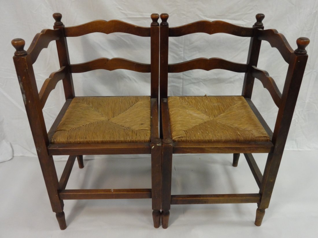 Pair of Oak Corner Chairs w/Rush Slip Seats: A pair of oak corner chairs with rush slip seats. 15 34" W x 15 3/4" D x 29 1/8" H. Good condition, the rush needs some repair.