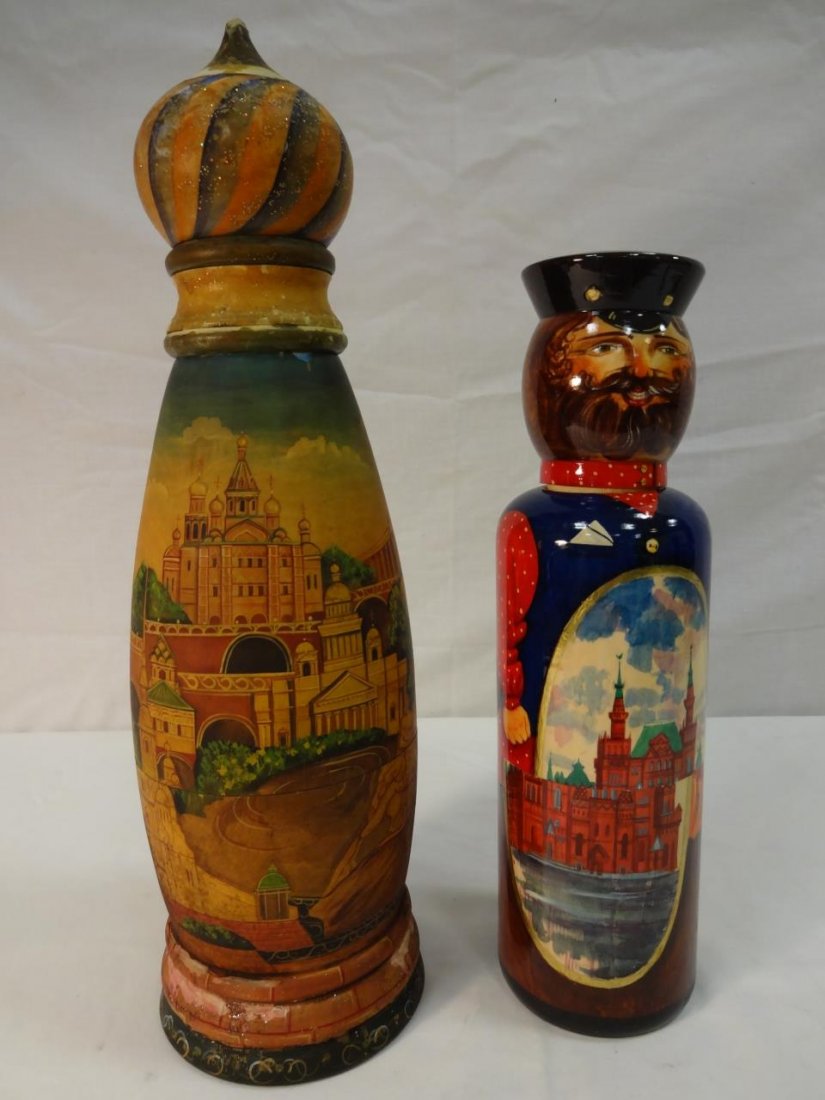 Lot of 2 Russian Lacquer Matryoshka/Nesting Dolls: Lot of two Russian lacquer matryoshka/nesting dolls. Larger measures 4 3/4" diameter x 16 1/4" H, scattered damage.