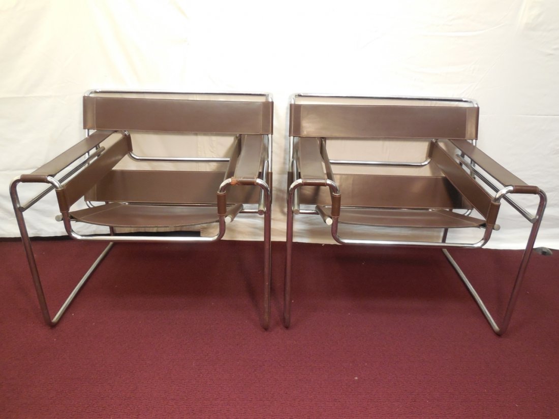 Marcel Breuer Style Chrome & Leather Chair: A pair of Marcel Breuer-style chrome and leather chair. 31" W x 27" D x 28 5/8" H. Excellent condition.