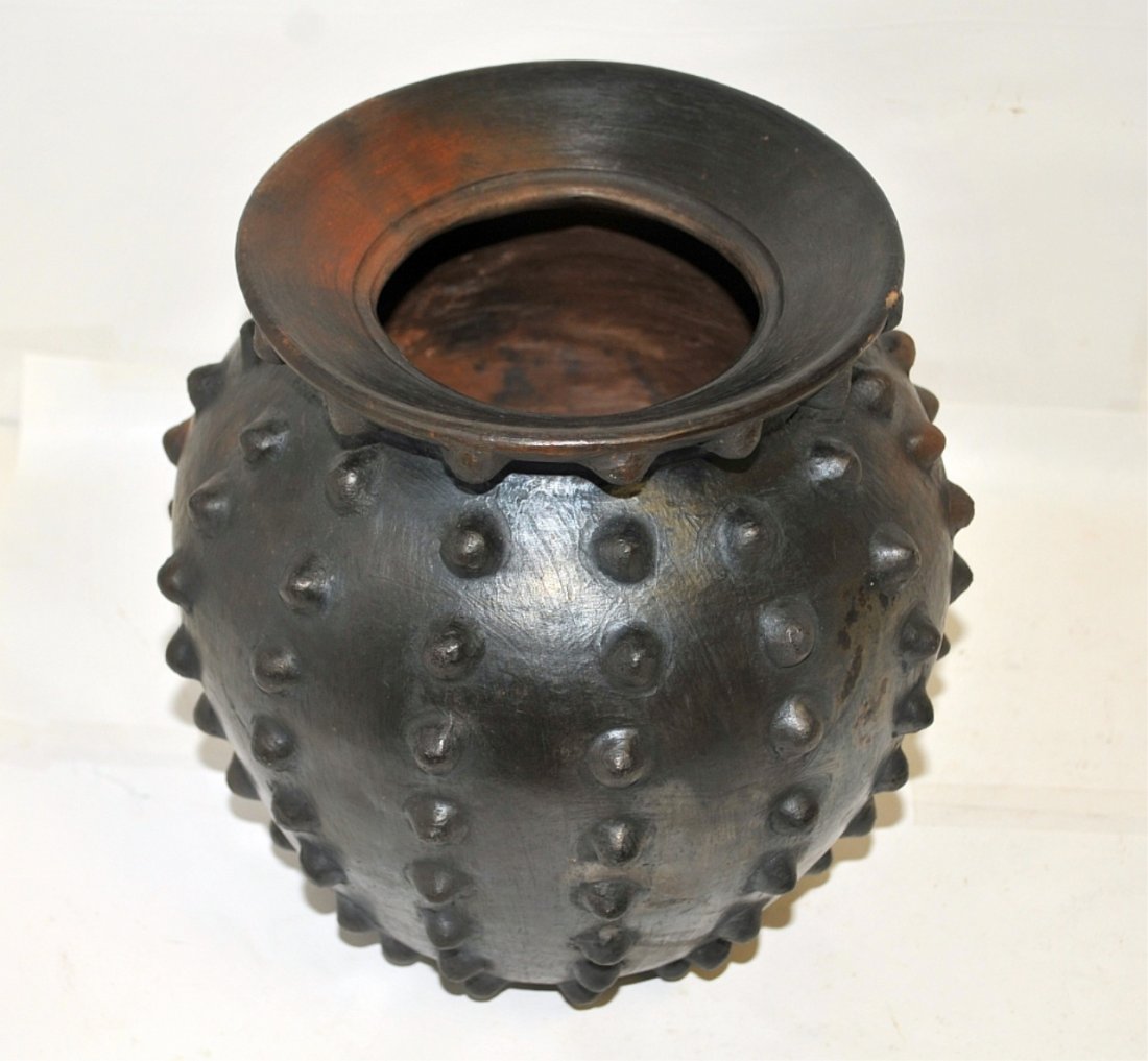Antique Smoke Finish Redware Hobnail Vessel: Vintage redware pottery urn or vase with numerous protrusions or hobnails and a matte smoke-colored glaze or finish. Measures 9 1/2" H x 9" W, excellent condition.