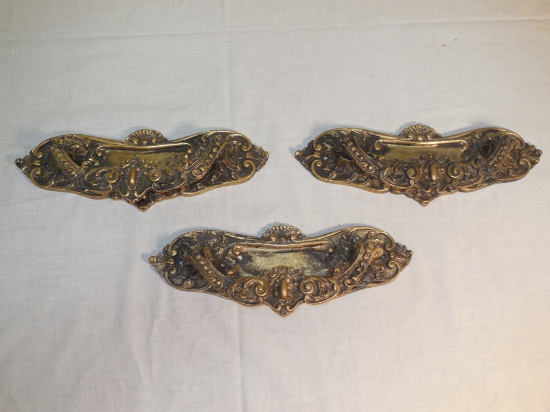 Lot of Ornate Decorative Brass Drawer Pulls: A lot of three ornate decorative brass drawer pulls. 11 3/4" W x 4 1/2" H x 2 3/8" D. Very good condition.