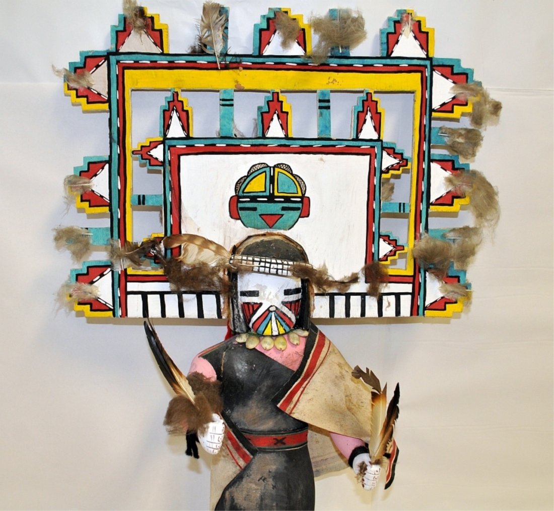 Vintage Alaskan Katchina Doll w/Wooden Headdress: Vintage Alaskan Inuit Katchina doll with a painted solid wood headdress. Measures 31" H x 19" W and 8"-10" D very good condition.