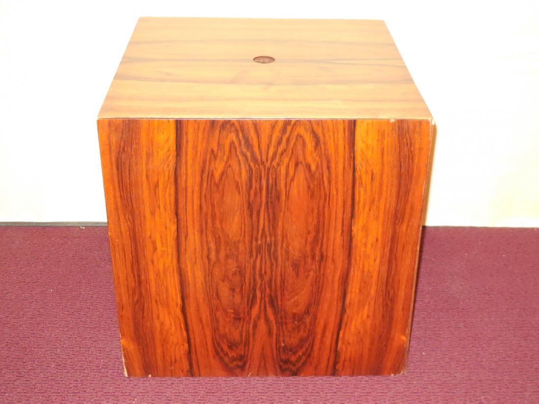 Mid Century Tray Tables Stored as a Cube: A mid century set of 6 tray tables that store as a cube. 16 5/8" W x 16 5/8" D x 1 5/8" H. Some chips on sides of laminate otherwise very good vintage conditin.