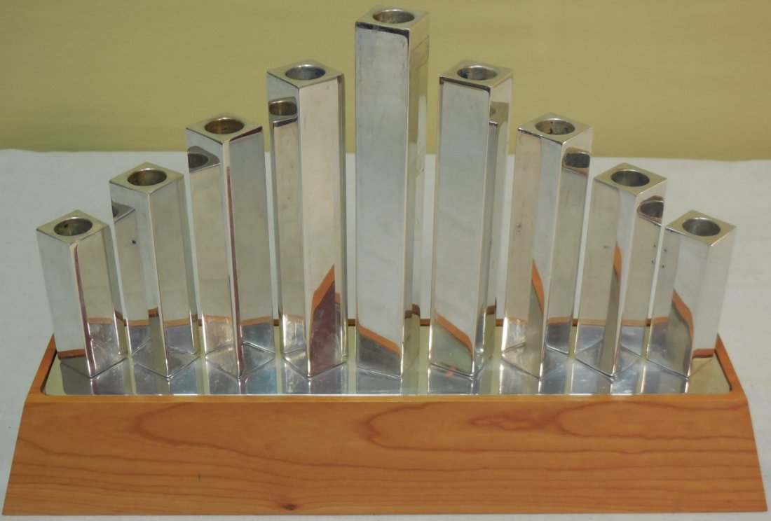 Nambe Studio Cherry Wood Menorah: A Nambe Studio cherry wood menorah. 15" W x 3 5/8" D x 9 1/2" H. Very good condition.