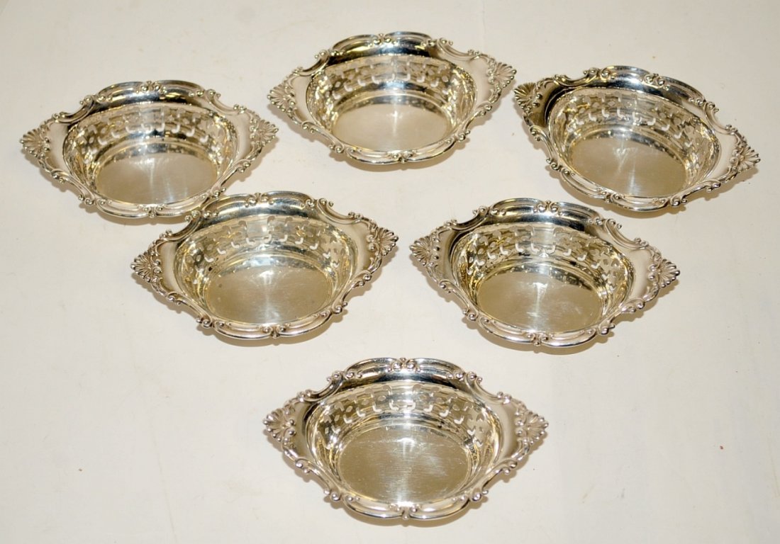 Six Small Sterling Reticulated Bowls: Set of six vintage .925 Sterling hallmarked diminutive reticulated oval bowls with a diaphonous scintillating and ebullient high-polished surface that transcends common table-ware. Each one measures 3