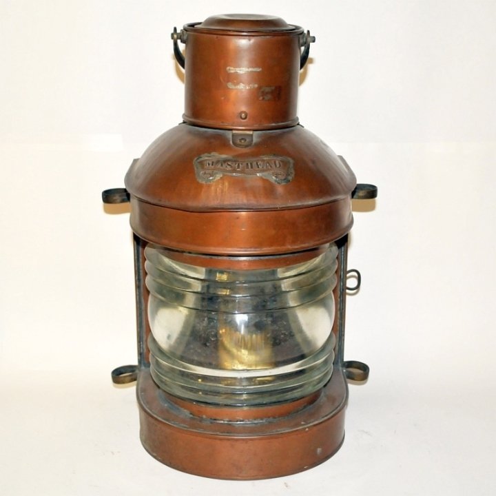 Large Antique Copper Ship Mast Light: An antique copper, brass, and tin ship mast light with a plaque reading "MASTHEAD" on the front. 8" W x 8" D x 16" H, very good used condition.