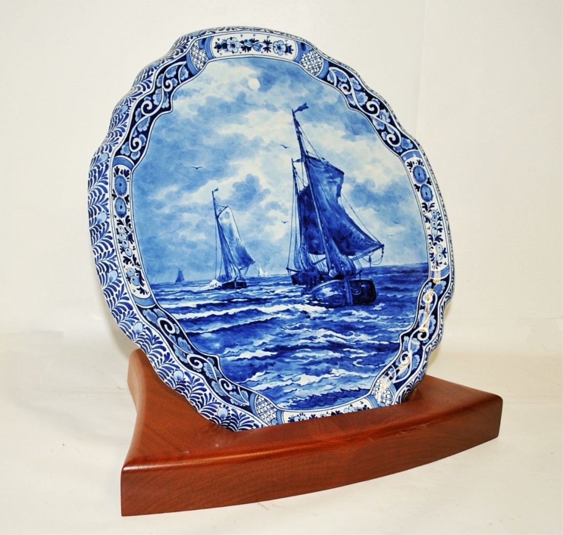 Antique Delft Commemorative Platter with Stand: Antique blue and white Delft commemorative platter with stand, "Retour Naar H. W. Mesdag 1831-1915". 15 1/2" H x 14 1/2" W, very good condition.