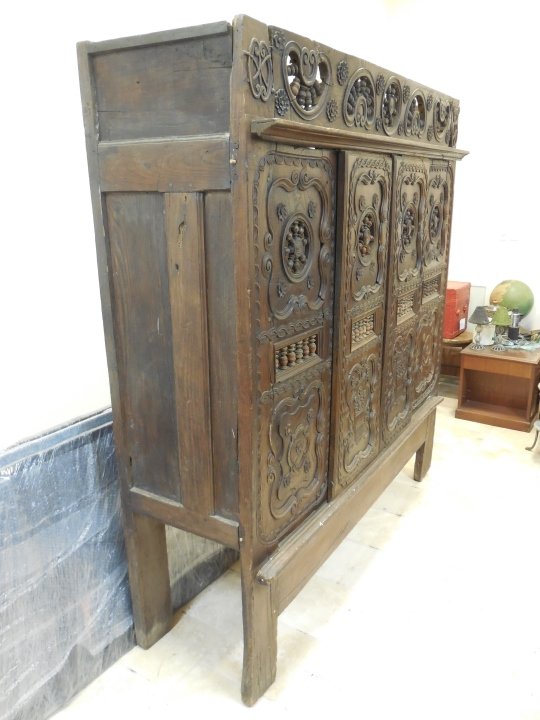 16th C. Carved Wood Linen Press/Cupboard: A 16th century carved wood linen press/cupboard. 71 1/4" W x 22 1/2" D x 74 1/4" H. Good antique condition.
