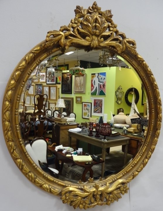 Carved Wood Gilt Convex Mirror: Carved gilt wood convex mirror. 32 1/2" H x 27 1/2" W, very good antique condition.