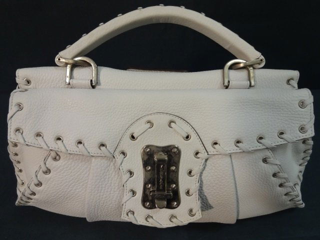 Vintage White Gianni Versace Handbag: Vintage white leather Gianni Versace handbag. Duel compartments, each with an interior zip pocket. 15 1/2" W x 5" D x *" H. Very good condition.