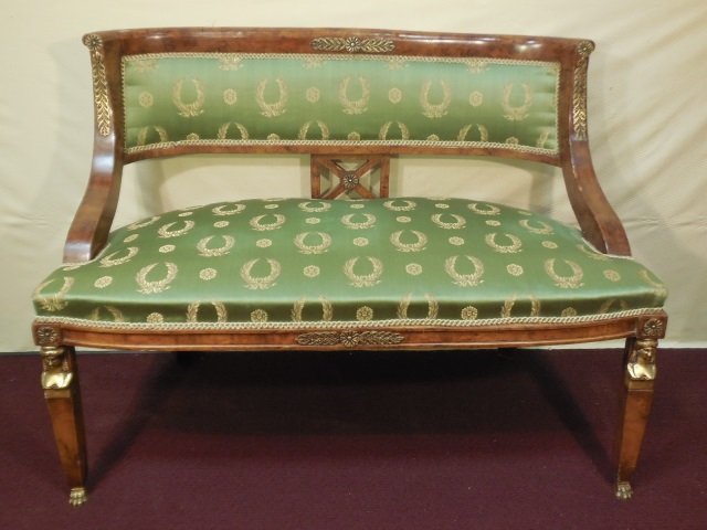 Antique Burl Walnut Empire Settee: Antique Empire settee, burl walnut frame with antique brass applied adornments. Gilded antique brass caryatid detail on legs. Claw feet. Upholstered in green silk Napoleonic wreath fabric.44" W x 24" 