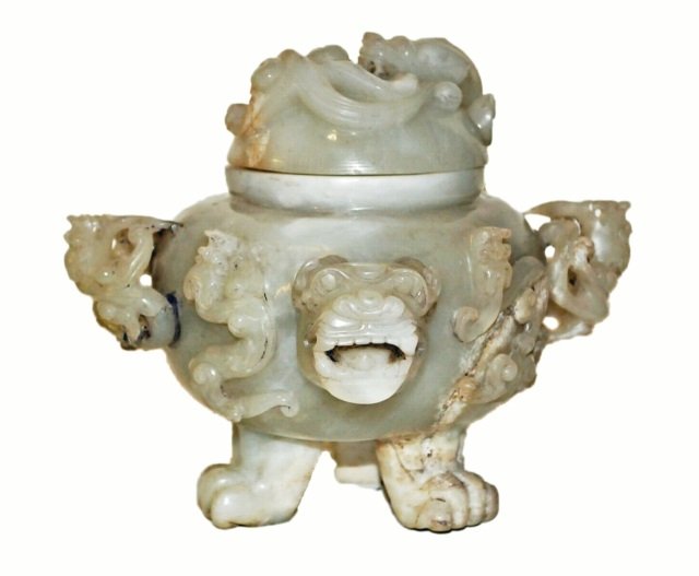 Ming Dynasty Chinese Jade Dragon Ointment: Dragon motif carved Chinese light green jade lidded ointment pot from the Ming Dynasty or earlier. Measures 6.25" high with lid by 8" in diameter. Very good condition.