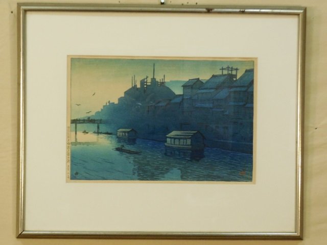 Kawase Hasui Color Wood Block Print: A Kawase Hasui (Japanese 1883-1957) color wood block print Do-Ton bori, "Osaka in the morning". Signed in the image, lower right. 10" H x 15" W. Very good condition.