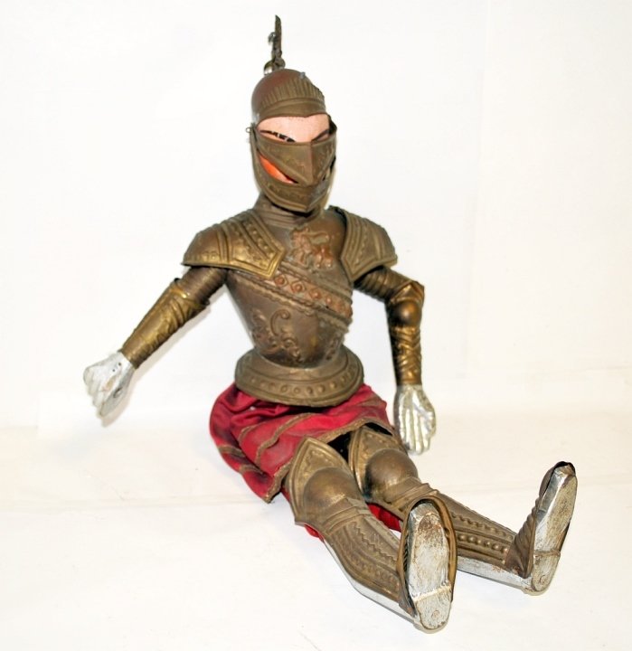 Antique Italian Marionette Knight in Armor Antique: Antique Italian marionette knight in armor. 9" W x 3" D x 24" H, good condition with missing sword and some missing feathers.