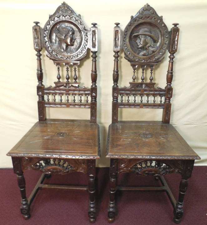 Pair of Antique Dutch Carved Oak Side Chairs: A lot of two Dutch antique carved wood side chairs. 17" W x 17" D x 43" H. Very good antique condition.