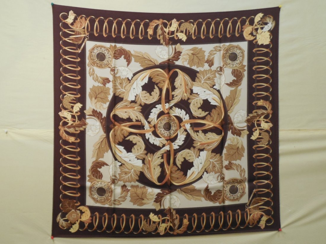 Patek Philippe Ermenegildo Zegna Silk Scarf Limited: Limited Edition Patek Philippe silk scarf designed by Ermenegildo Zegna. Designs recalls Patek Philippe's wristwatch bracelet links. Very dark brown/aubergine and gold colors.35 1/2" square. Very ligh