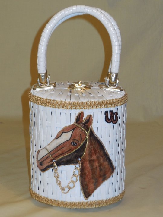 Marilyn Levine Basket Handbag w/Horse Head: A Marilyn Levine basket style hand bag with horse head applique. 6 1/4" W x 7" D x 10 5/8" H. Very good condition. Shipping available within the Continental USA (excludes insurance) $30.00