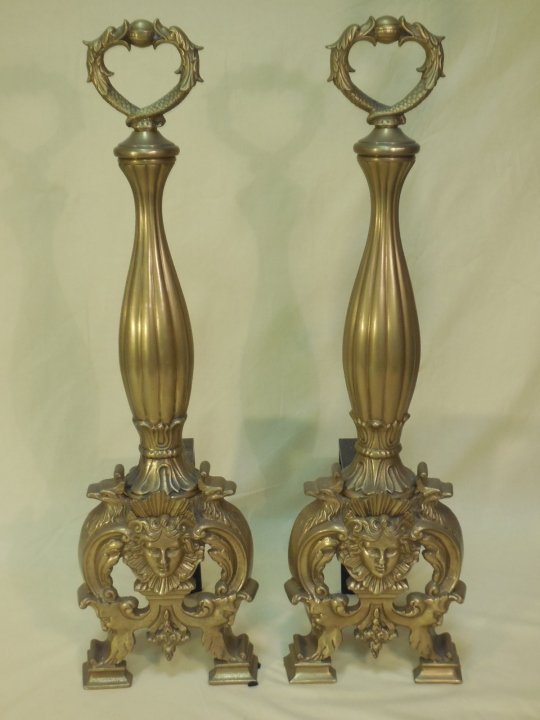 Pair of Antique Brass Andirons: Pair of antique brass andirons. 7 5/8" W x 8 1/4" D x 26 1/2" H. In very good condition.