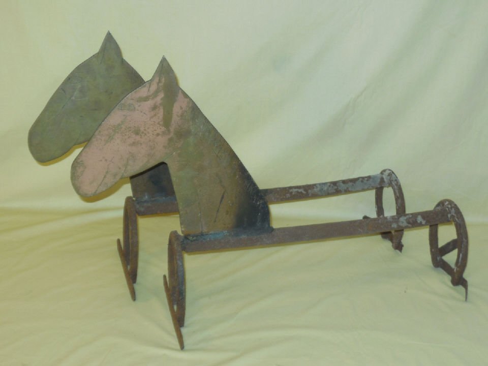 Pair of Vintage Brass Horse Andirons: Pair of vintage brass horse andirons. Copper patina, stands are horseshoes. 8 1/4" W x 25" long x 17" H. In good vintage condition.