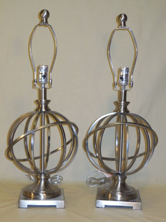 Pair Contemporary Modern Armillary Sphere Lamps: Pair of nickel finish armillary sphere style lamps. 10 1/4" D x 18 3/4" H. Very good condition. Shipping available in the continental USA (excludes insurance) $70.00.