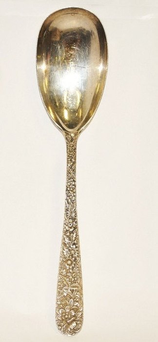 Vintage S. Kirk & Son Sterling Silver Ladle: Vintage .925 sterling silver soup or punch ladle with repousse floral handle. Hallmarked "S KIRK & Son." Measures 9.5" long by 2.25" wide at bowl. Weighs 104.1 grams. Very good condition.