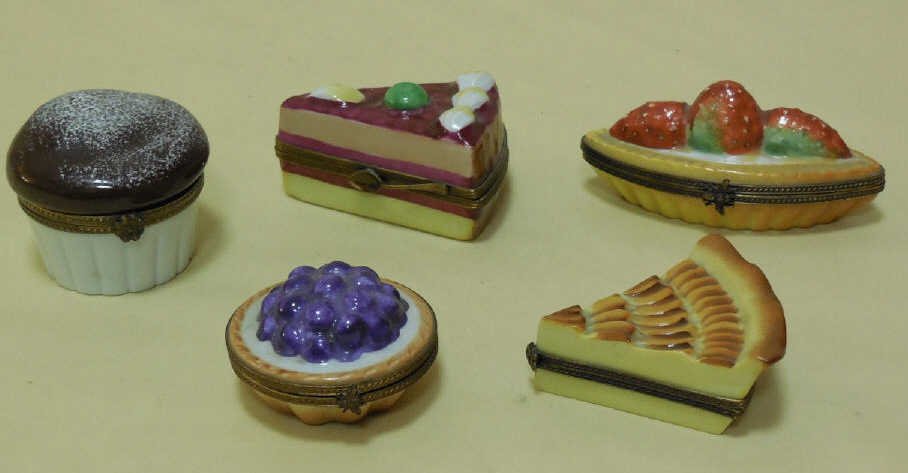 Lot of 5 Vintage Limoges Boxes Pies & Tarts: Lot of 5 Vintage hand painted Limoges boxes. Various pies and tarts. Including a strawberry and blueberry tart, apple tarte tatin, chocolate mousse and fancy cake slice. Largest measures: 2 1/2" W x 2