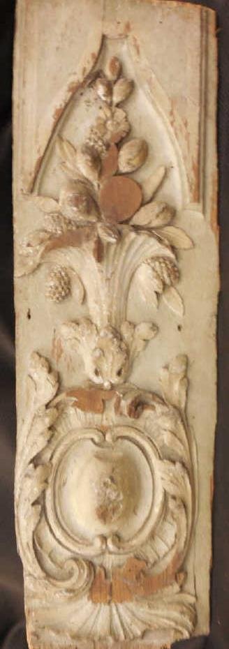 18th Century Antique French Rococo Wall Panel Trim: 18th century antique French rococo wall panel trim. Carved wood piece of room panel. Showing a floral basket, rocaille shell and scrollwork. Measures 19 by 6 inches. Shipping available within the cont