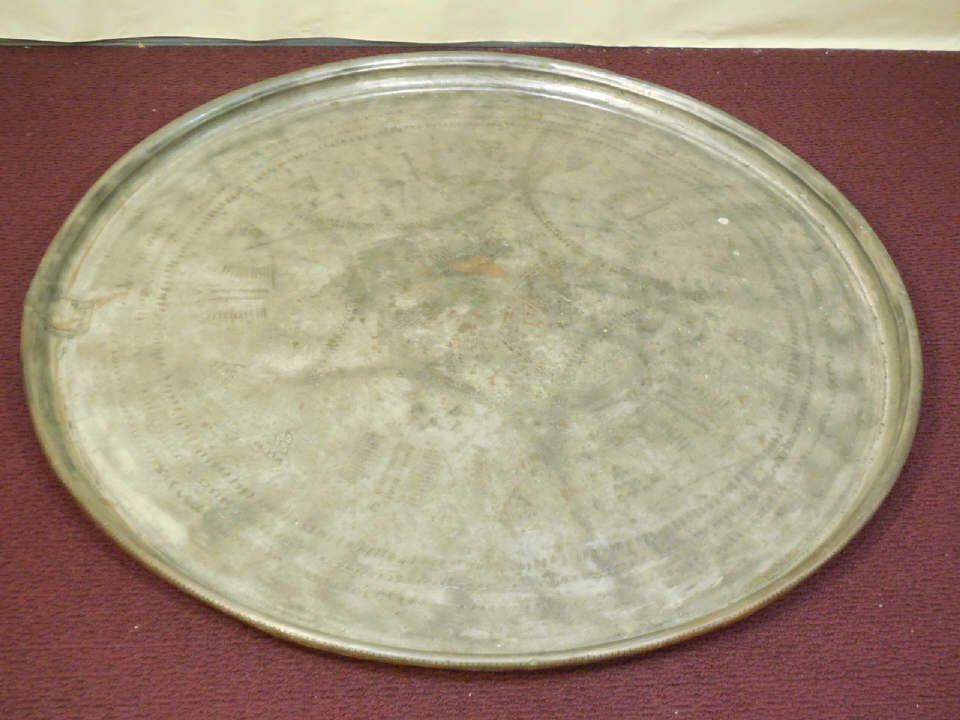 Vintage Large Round Metal Tray: Vintage large round metal tray. Some incising present. Copper patina on back. 35" diameter. Good vintage condition.