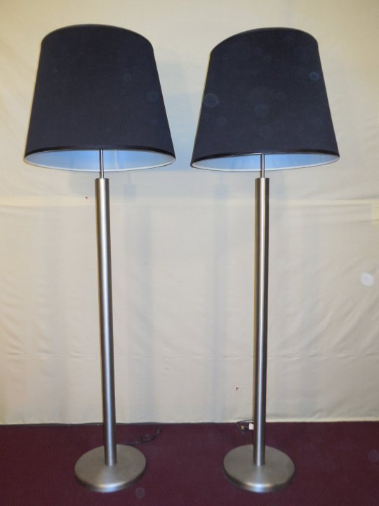Kovacs Brushed Pewter Finish Floor Lamps w/ Shades: Brushed pewter finish floor lamps. Shades are black ribbed paper Lamps are made by Kovacs. Lamps have a dimmer. Each lamp takes 5 bulbs. 12"