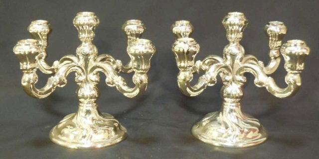 Pair of Sterling Silver Candelabra Candlesticks: Pair of antique sterling silver candelabra, candlesticks. four arms each. 10 1/2" diameter x 8" H. In very good original condition. Shipping available in the Continental USA (excludes insurance) $45.0