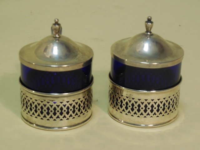 Antique Sterling & Cobalt Glass Salt & Pepper: Antique Sterling & cobalt glass salt & pepper cellars with spoon. 2 1/8" D x 3 1/8" H. In very good original condition.